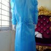 Áo choàng vải không dệt dùng một lần - vai khong det phu nhua PE 1